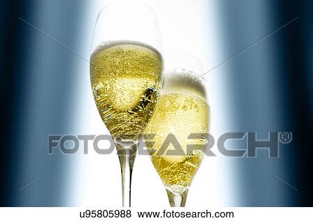 Two glasses of champagne View Large Photo Image Stock Photo - Two glasses of champagne. Fotosearch