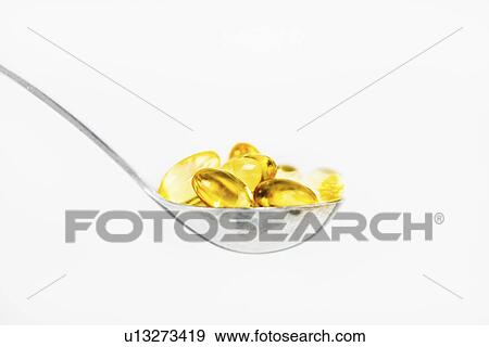 Stock Photo - Vitamin E capsules. Fotosearch