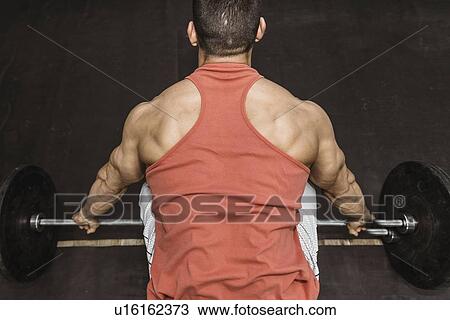 Stock Image - Weightlifting training. Fotosearch