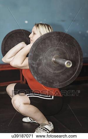 Weightlifting training View Large Photo Image Stock Image - Weightlifting training. Fotosearch