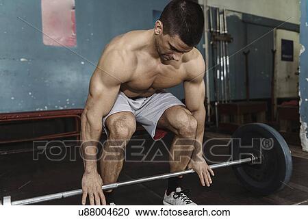 Stock Image - Weightlifting training. Fotosearch