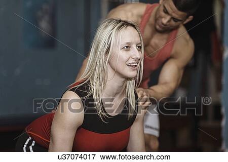 Stock Photo - Weightlifting training. Fotosearch
