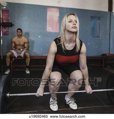 Stock Photography - Weightlifting training. Fotosearch