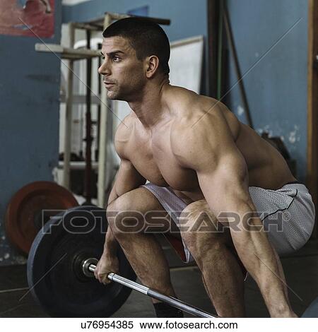 Stock Photography - Weightlifting training. Fotosearch