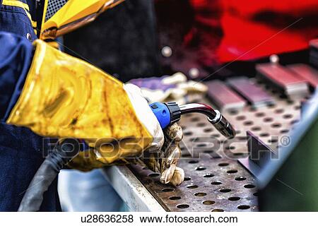 Welder at work View Large Photo Image Stock Photo - Welder at work. Fotosearch