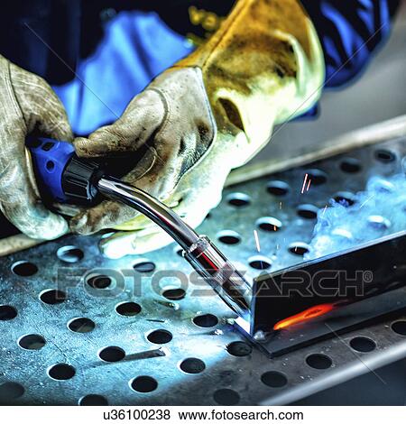 Welder at work View Large Photo Image Stock Photo - Welder at work. Fotosearch