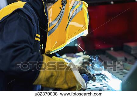 Stock Photo - Welder at work. Fotosearch