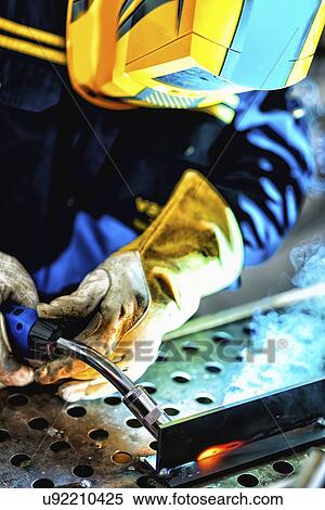 Stock Photography - Welder at work. Fotosearch