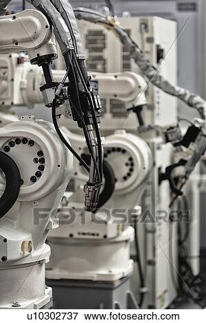 Stock Photo - Welding robot. Fotosearch