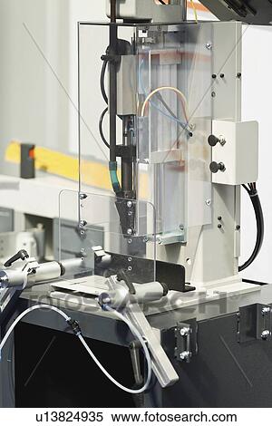Stock Photography - Window profile processing machine. Fotosearch