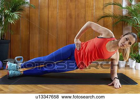 Woman doing Side Plank View Large Photo Image Stock Photo - Woman doing Side Plank. Fotosearch