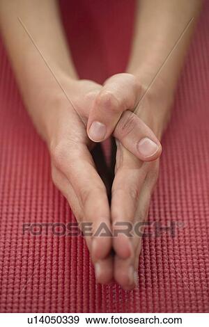 Stock Photo - Woman doing yoga. Fotosearch