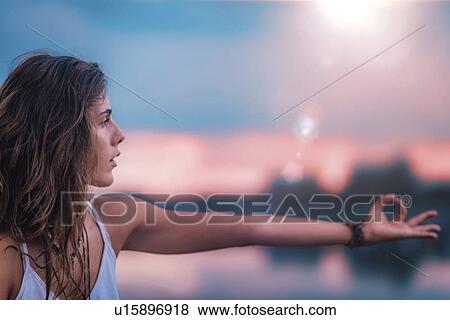Stock Photo - Woman doing yoga. Fotosearch