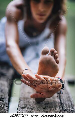 Woman doing yoga View Large Photo Image Stock Photo - Woman doing yoga. Fotosearch