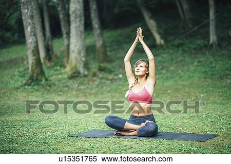 Woman doing yoga View Large Photo Image Stock Photography - Woman doing yoga. Fotosearch