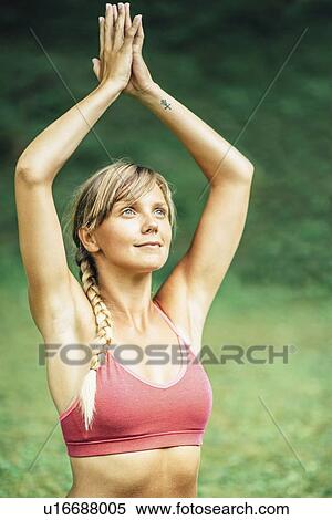 Stock Photography - Woman doing yoga. Fotosearch