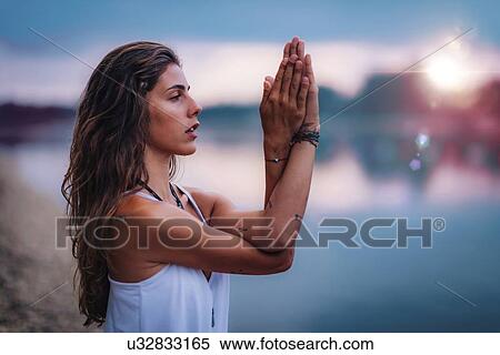 Woman doing yoga View Large Photo Image Stock Photography - Woman doing yoga. Fotosearch