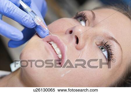 Stock Photography - Woman having hyaluronic acid injections. Fotosearch