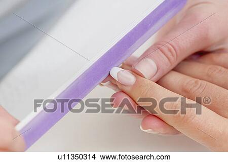 Woman having manicure View Large Photo Image Picture - Woman having manicure. Fotosearch