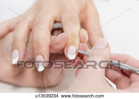 Woman having manicure View Large Photo Image Picture - Woman having manicure. Fotosearch