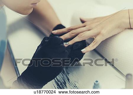 Woman having manicure View Large Photo Image Picture - Woman having manicure. Fotosearch