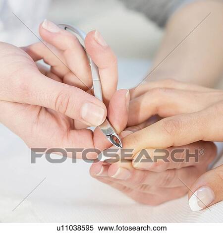 Woman having manicure View Large Photo Image Stock Photography - Woman having manicure. Fotosearch