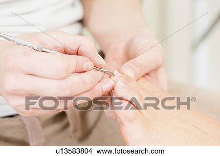 Woman having pedicure View Large Photo Image Picture - Woman having pedicure. Fotosearch
