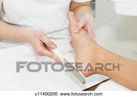 Woman having pedicure View Large Photo Image Stock Image - Woman having pedicure. Fotosearch