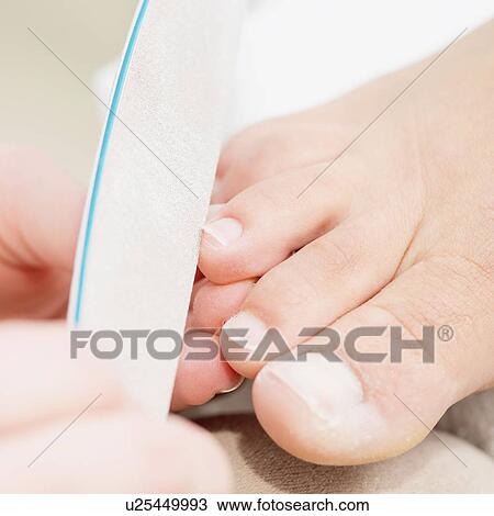 Woman having pedicure View Large Photo Image Stock Image - Woman having pedicure. Fotosearch