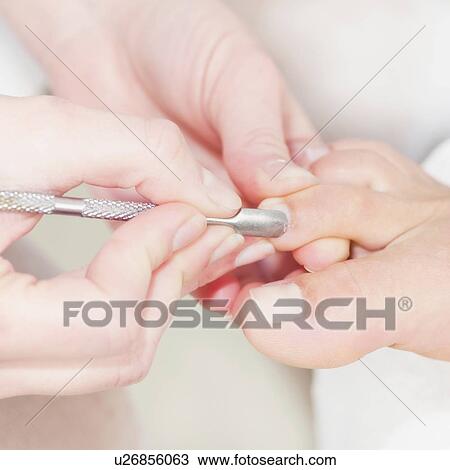 Woman having pedicure View Large Photo Image Stock Image - Woman having pedicure. Fotosearch