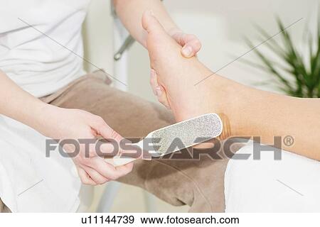 Woman having pedicure View Large Photo Image Stock Photo - Woman having pedicure. Fotosearch