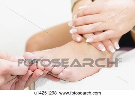 Woman having pedicure View Large Photo Image Stock Photo - Woman having pedicure. Fotosearch