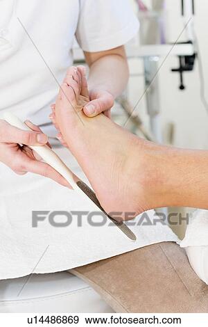 Woman having pedicure View Large Photo Image Stock Photo - Woman having pedicure. Fotosearch