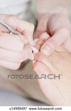Woman having pedicure View Large Photo Image Stock Photo - Woman having pedicure. Fotosearch