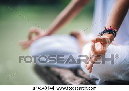 Woman meditating View Large Photo Image Picture - Woman meditating. Fotosearch