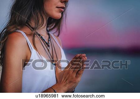 Woman meditating View Large Photo Image Stock Image - Woman meditating. Fotosearch