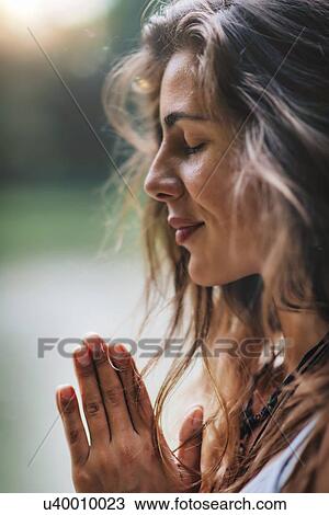Woman meditating View Large Photo Image Stock Image - Woman meditating. Fotosearch