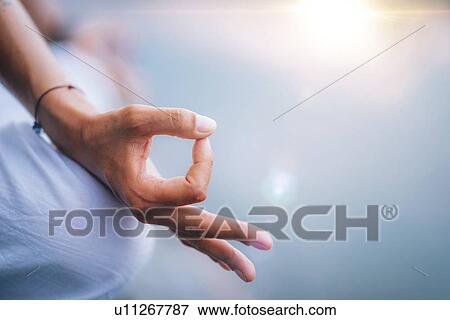 Woman meditating View Large Photo Image Stock Photo - Woman meditating. Fotosearch