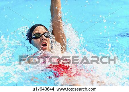 Woman swimming backstroke View Large Photo Image Picture - Woman swimming backstroke. Fotosearch