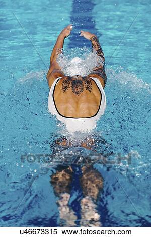 Woman swimming butterfly View Large Photo Image Stock Photography - Woman swimming butterfly. Fotosearch