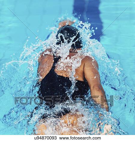 Woman swimming front crawl View Large Photo Image Stock Image - Woman swimming front crawl. Fotosearch