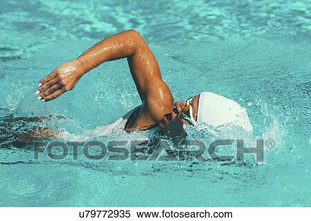 Woman swimming front crawl View Large Photo Image Stock Photography - Woman swimming front crawl. Fotosearch
