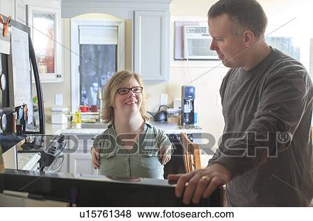 Stock Photo - Woman with TAR Syndrome at home. Fotosearch