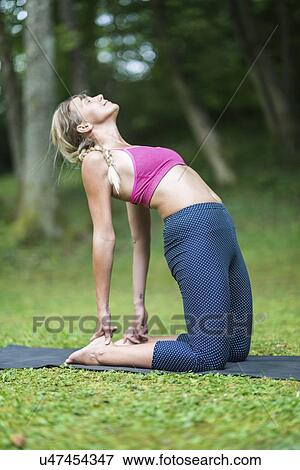 Stock Photo - Yoga camel pose. Fotosearch