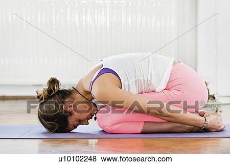 Yoga child's pose View Large Photo Image Stock Photo - Yoga child's pose. Fotosearch