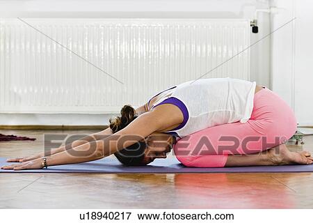 Stock Photo - Yoga child's pose. Fotosearch