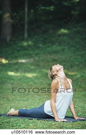 Yoga cobra position View Large Photo Image Stock Photograph - Yoga cobra position. Fotosearch