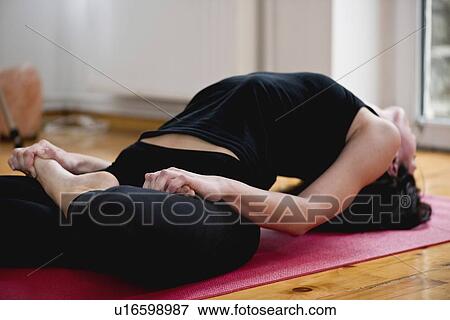 Stock Photo - Yoga fish posture. Fotosearch