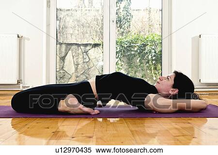 Stock Photography - Yoga fixed firm pose. Fotosearch