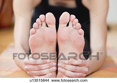 Picture - Yoga forward bend. Fotosearch